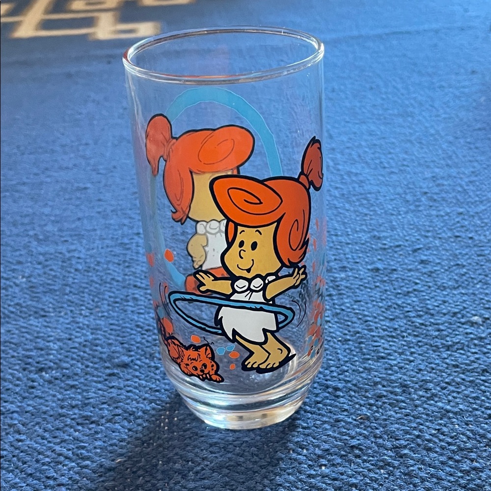 Vintage Cartoon Character Glass with Orange and White Design